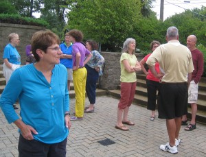 Volunteers gathering on the patio for fellowship